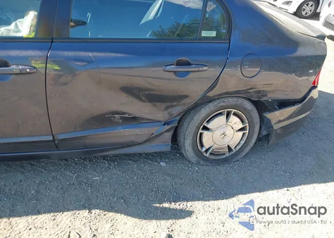 2010 Honda Civic Hybrid z USA, uszkodzony, nr VIN JHMFA3F23AS003464